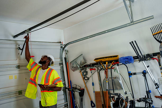 Professional Garage Door Installation technician working in Louisville, IL